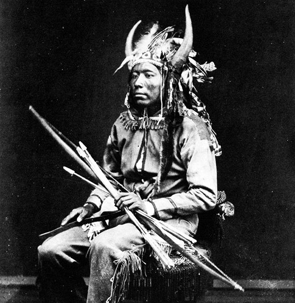 Native American with bow and arrows
