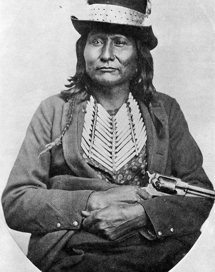 Native American with a pistol